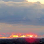 img_0001-sunrise-peeking-thru-clouds